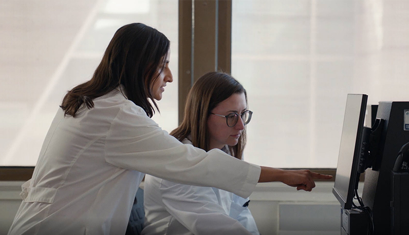 Advanced Diagnostic Laboratories scientists performing diagnostic testing