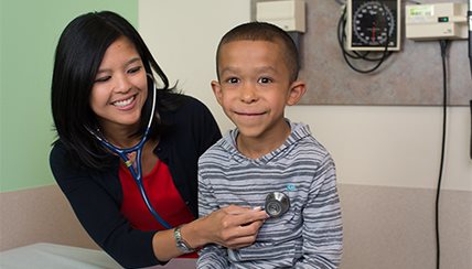 Physician and child patient