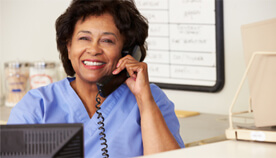 Woman answering the telephone